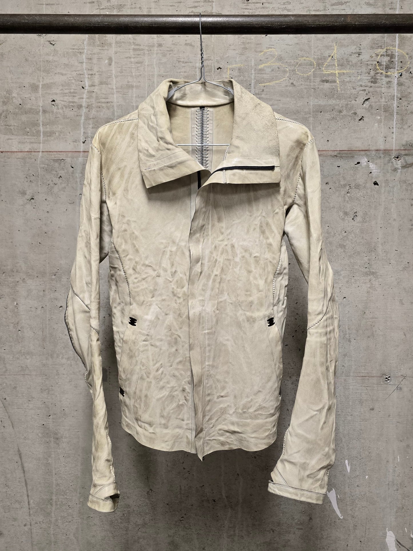 Isaac Sellam: “Experience” Pale Yellow Overlock High Neck Metal Spine Lambskin Leather Jacket