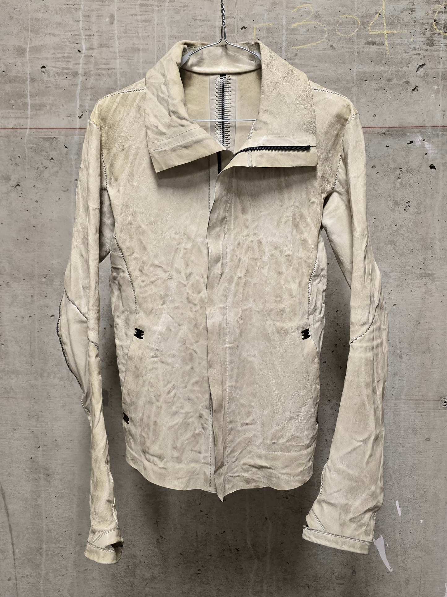 Isaac Sellam: “Experience” Pale Yellow Overlock High Neck Metal Spine Lambskin Leather Jacket