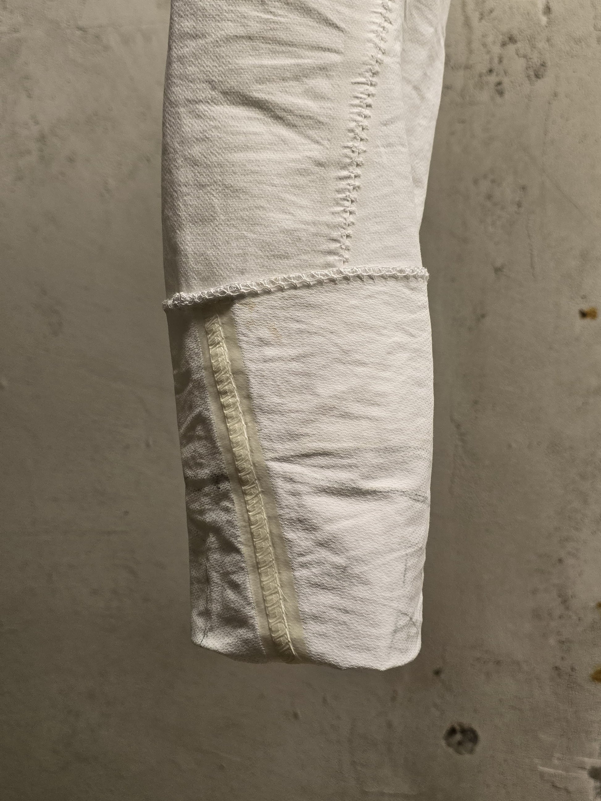 Carol Christian Poell 'PM/2671OD-IN BETWEEN/2' Object-dyed Visible Meltlock Front Zip Trousers detail | DRIEW GARMENTS
