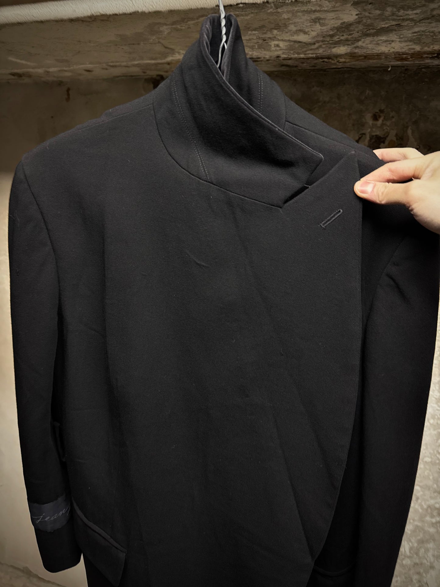 COMME des GARÇONS Late 80s 'Jean Paul Gaultier' Woven Tag Asymmetric Open-front Blazer detail | DRIEW GARMENTS