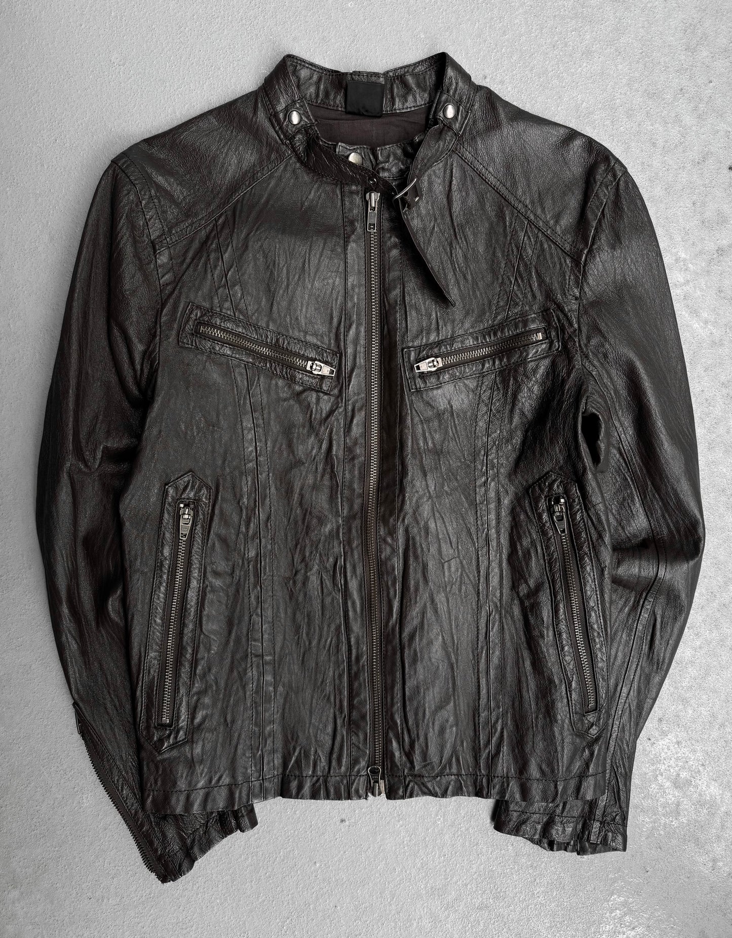 The Jackrose Early 00s Multi-pockets Pig Skin Leather Rider Jacket features a black leather build with front zipper, two zippered chest pockets, and two side pockets—ideal for fans of Japanese menswear and biker style.