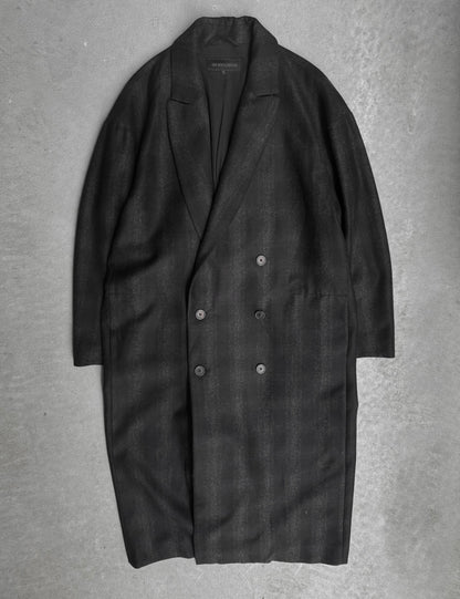 Dark gray coat on a textured gray background