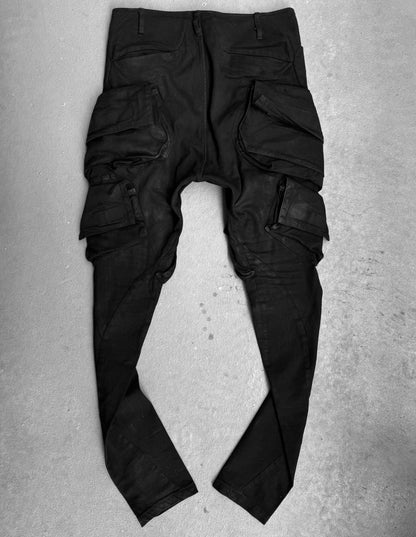 Julius_7 SS15 “prism;” Waxed Velcro Gas-Mask Cargos Skinny Denim