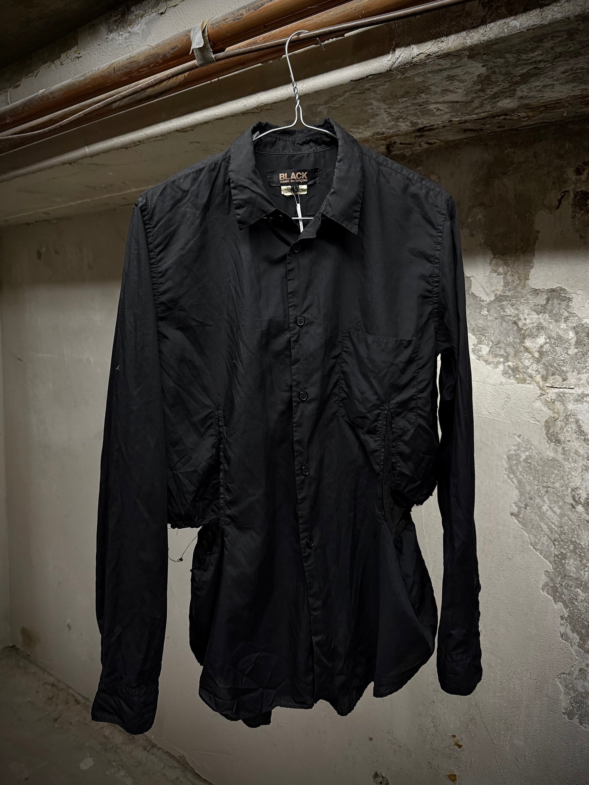 COMME des GARÇONS BLACK COMME des GARÇONS SS19 Distressed Side Cut-Out Shirt | Archive Fashion Toronto