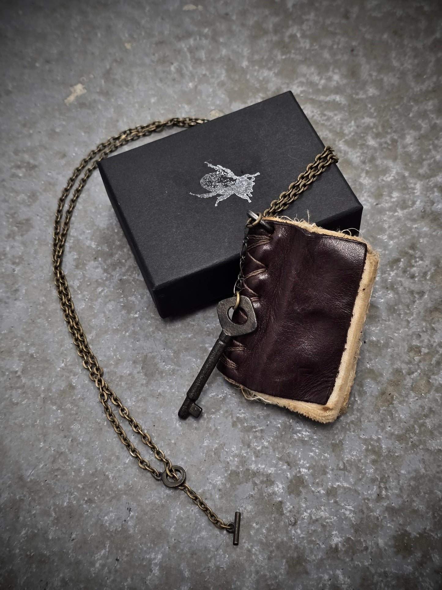 KLASICA Key & Leather Book Brass Chain Necklace detail | DRIEW GARMENTS
