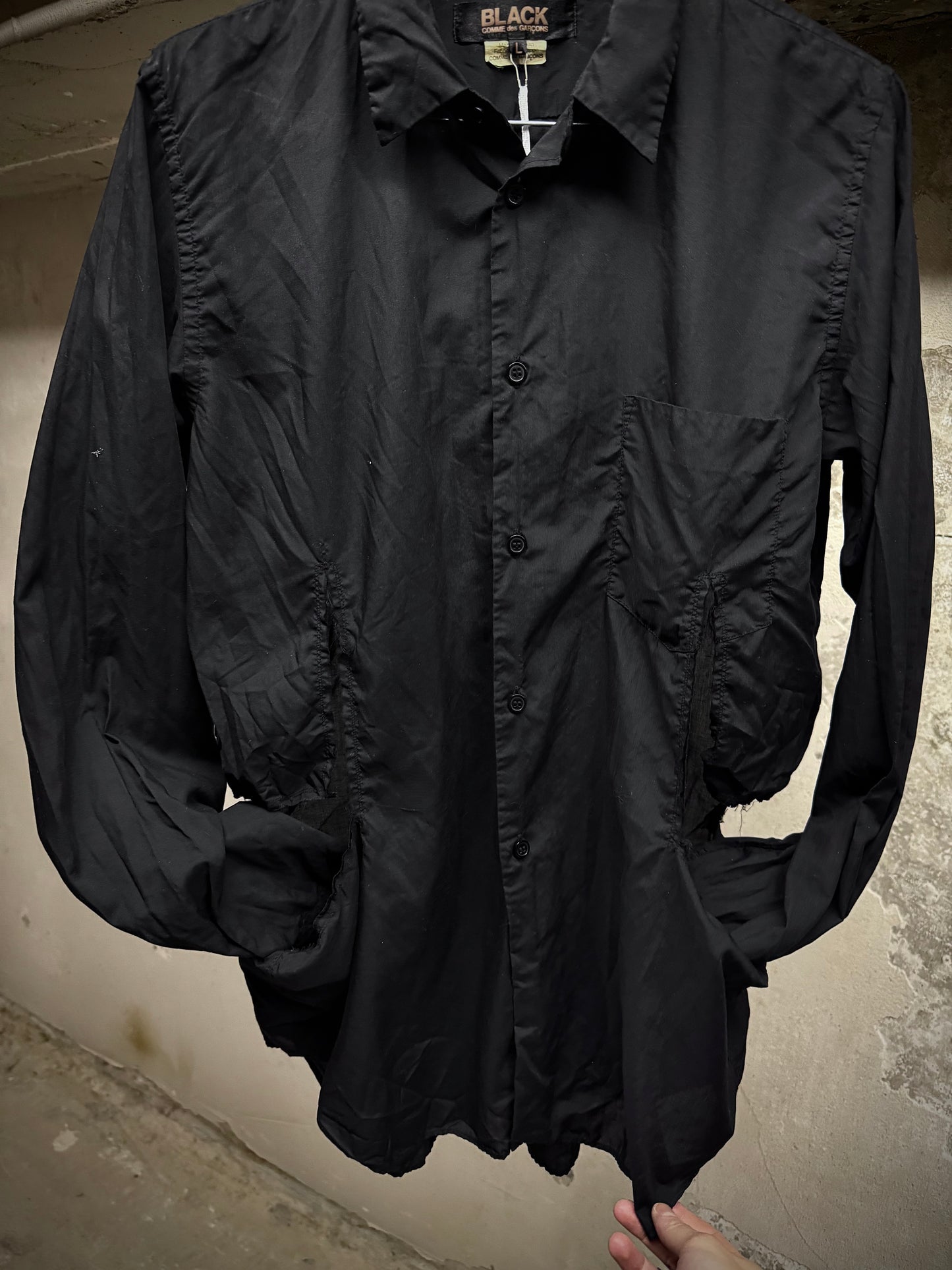 COMME des GARÇONS BLACK COMME des GARÇONS SS19 Distressed Side Cut-Out Shirt detail | DRIEW GARMENTS