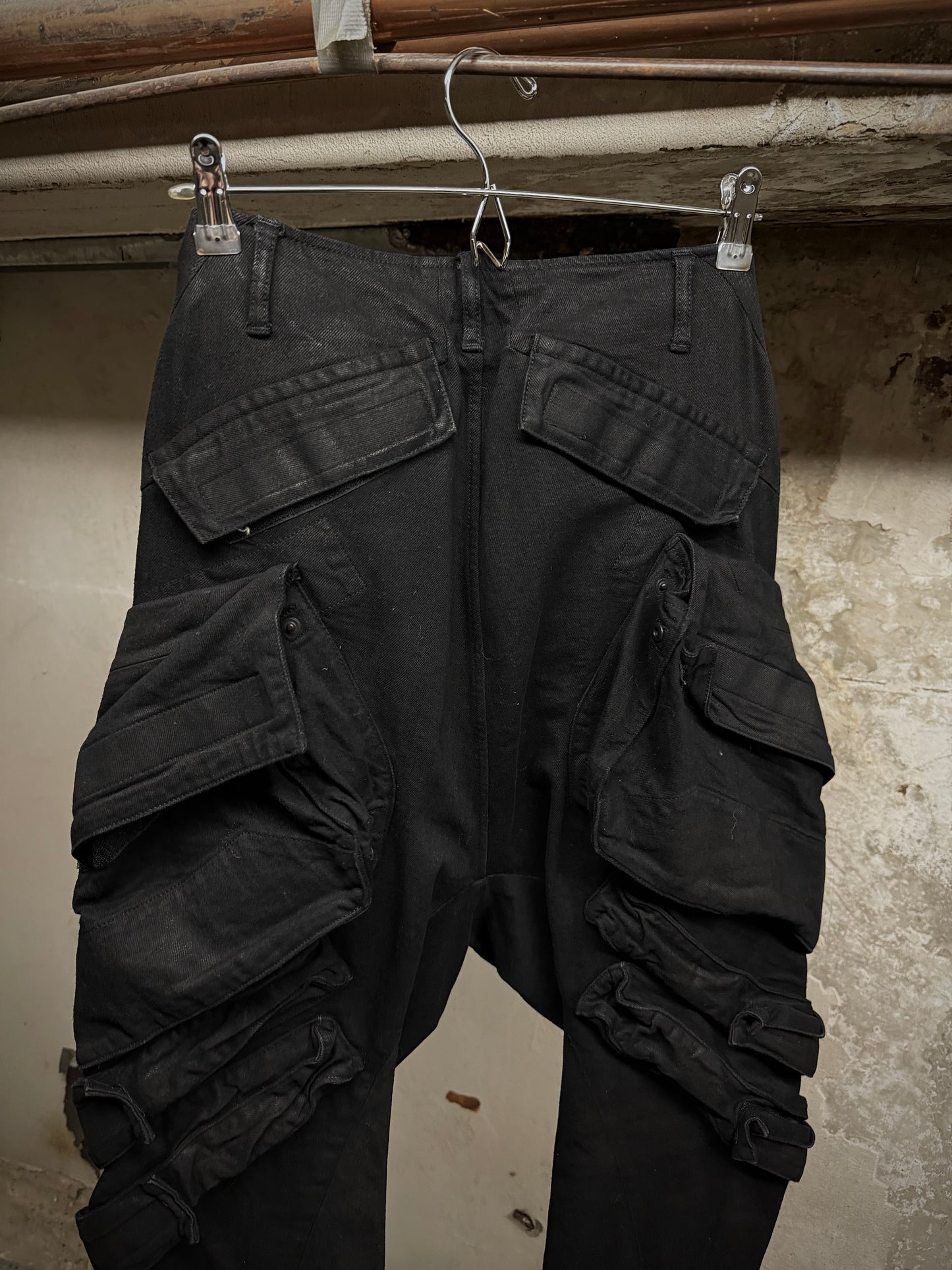 Julius_7 SS15 “prism;” Waxed Jumbo Velcro Gas-Mask Cargos Denim