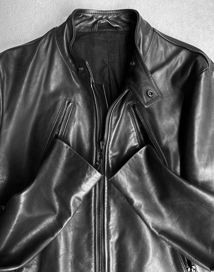 Maison Martin Margiela AW10-11 Kokone Black Horse Leather 5-zip Moto Rider Jacket, size 44/M, slim fit with stand-up collar and two diagonal chest zippers. Laid flat with sleeves crossed. Condition: 9/10.