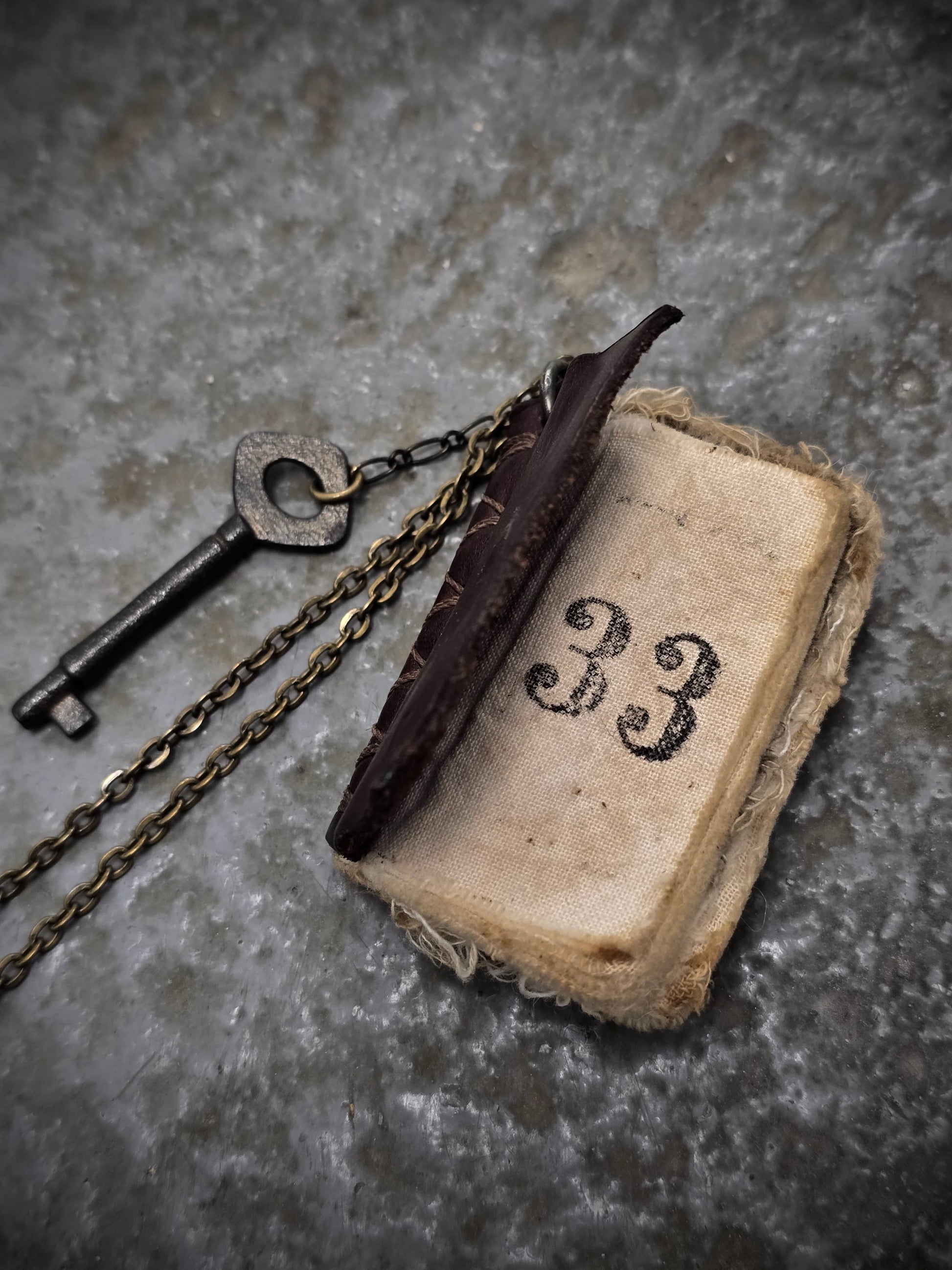 KLASICA Key & Leather Book Brass Chain Necklace detail | DRIEW GARMENTS