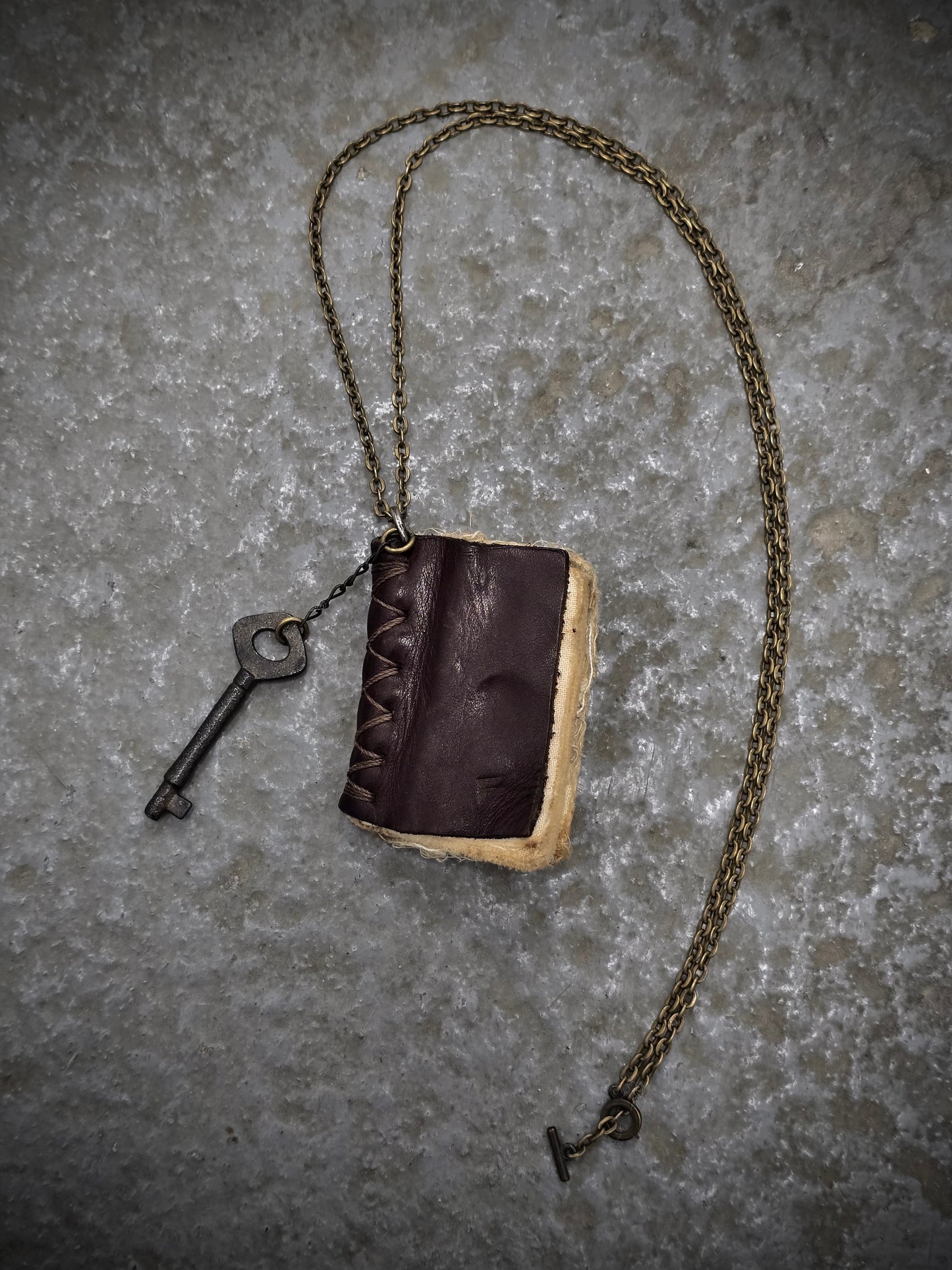 KLASICA Key & Leather Book Brass Chain Necklace | Archive Fashion Toronto