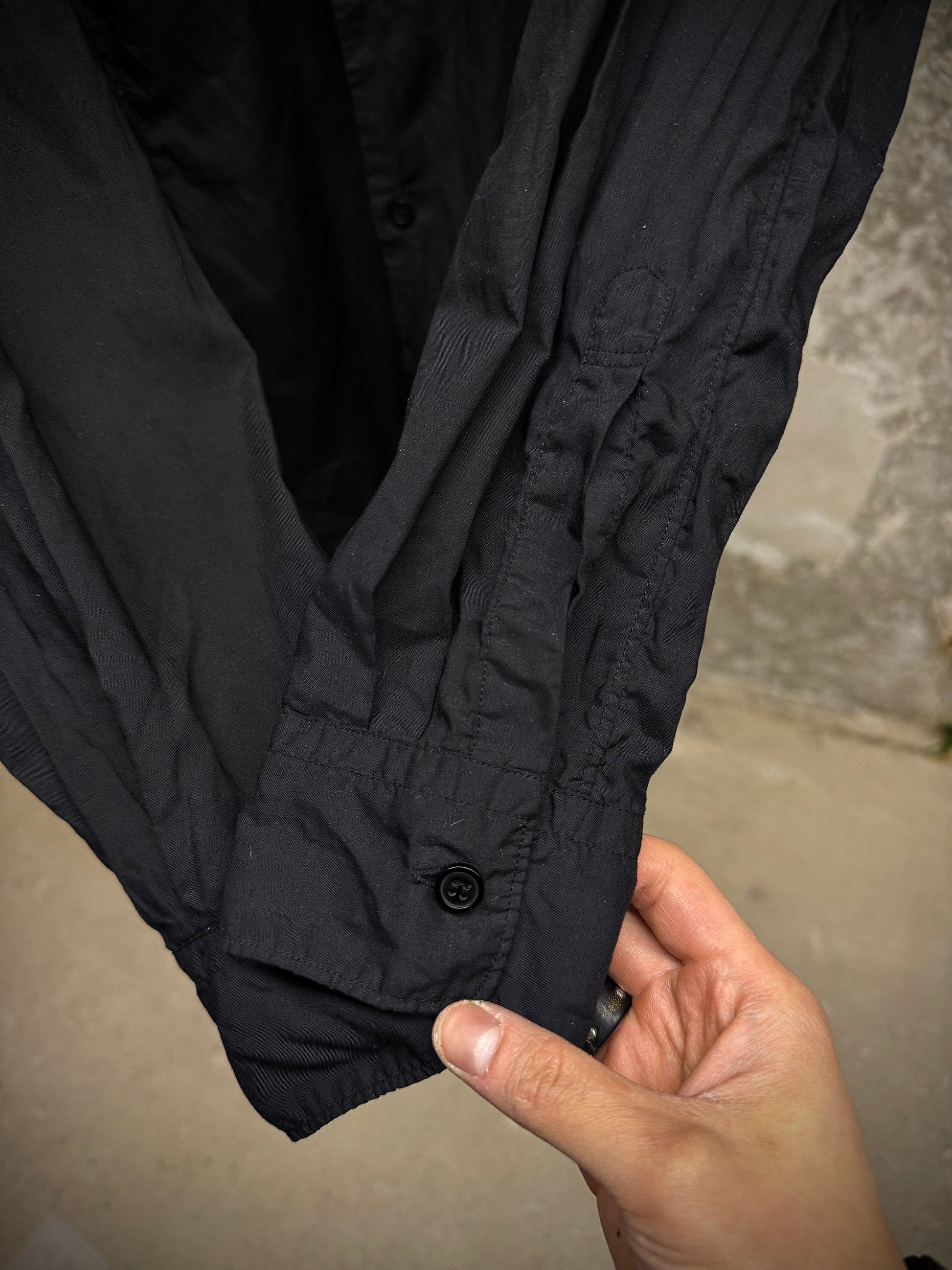 COMME des GARÇONS BLACK COMME des GARÇONS SS19 Distressed Side Cut-Out Shirt detail | DRIEW GARMENTS