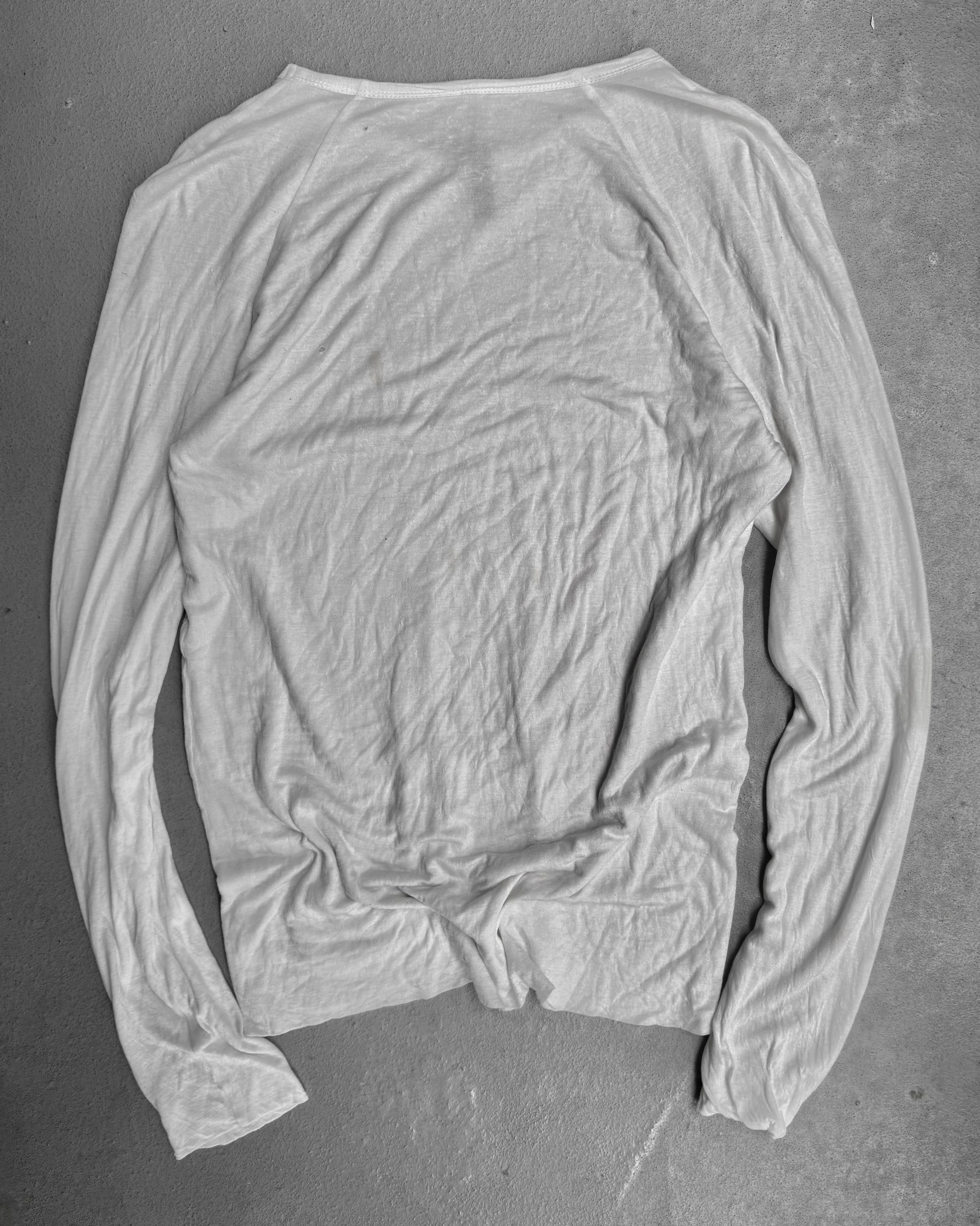 White long-sleeve shirt on a gray background