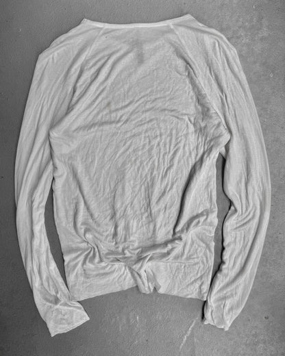 White long-sleeve shirt on a gray background