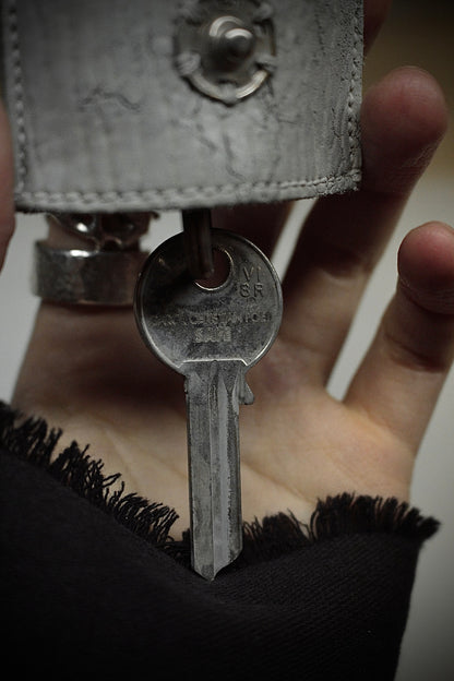 Carol Christian Poell ‘MM/2265 CUBS-PTC/33’ Silver Hook Key Horse Leather Case detail | DRIEW GARMENTS