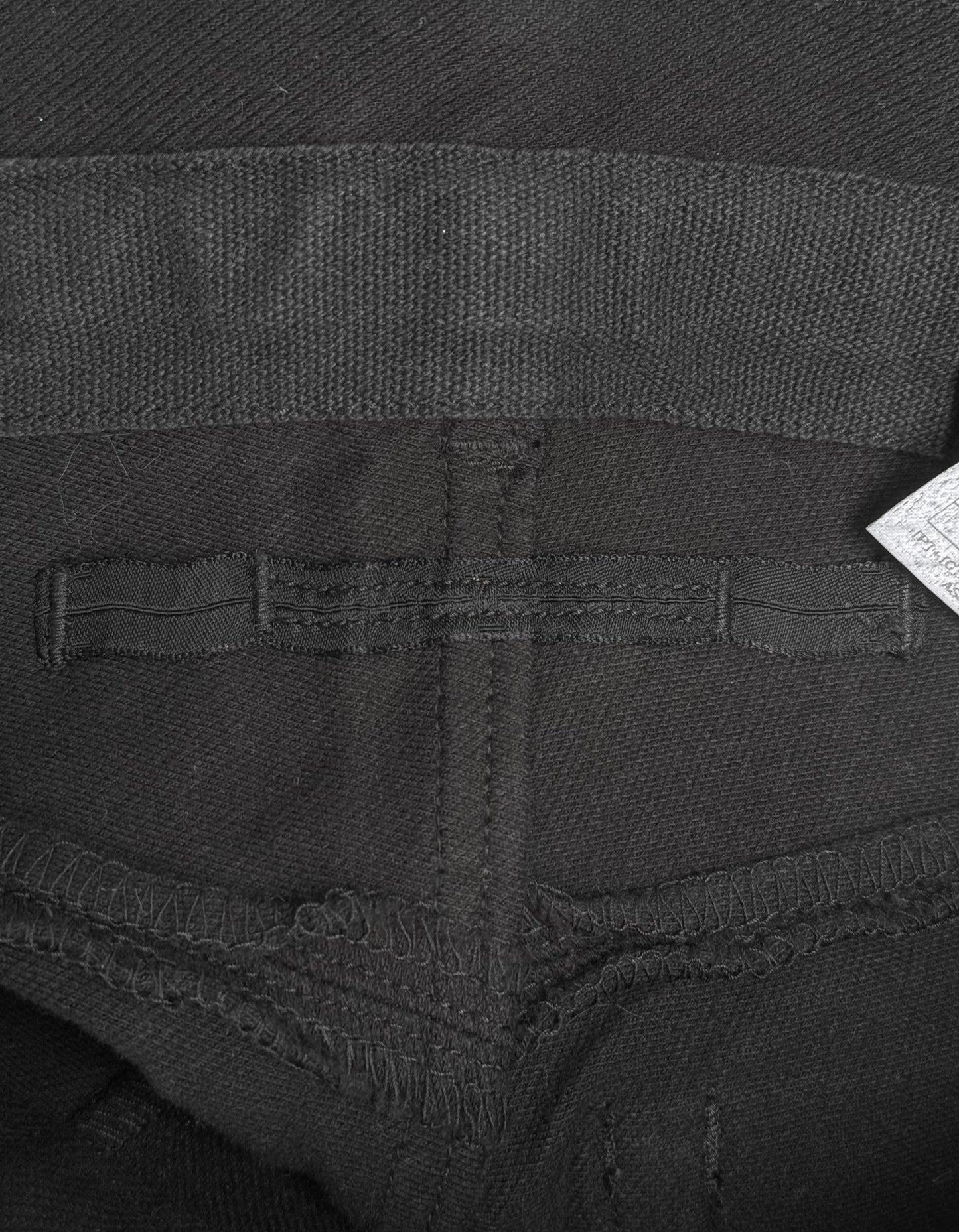 Julius_7 SS15 "prism;" Geometric Drop-crotch Wax Coated Knit Denim