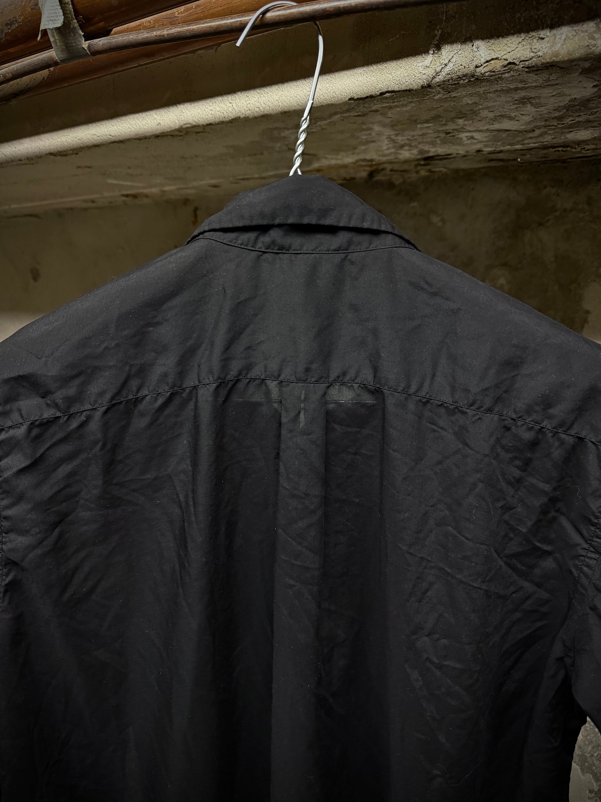 COMME des GARÇONS BLACK COMME des GARÇONS SS19 Distressed Side Cut-Out Shirt detail | DRIEW GARMENTS