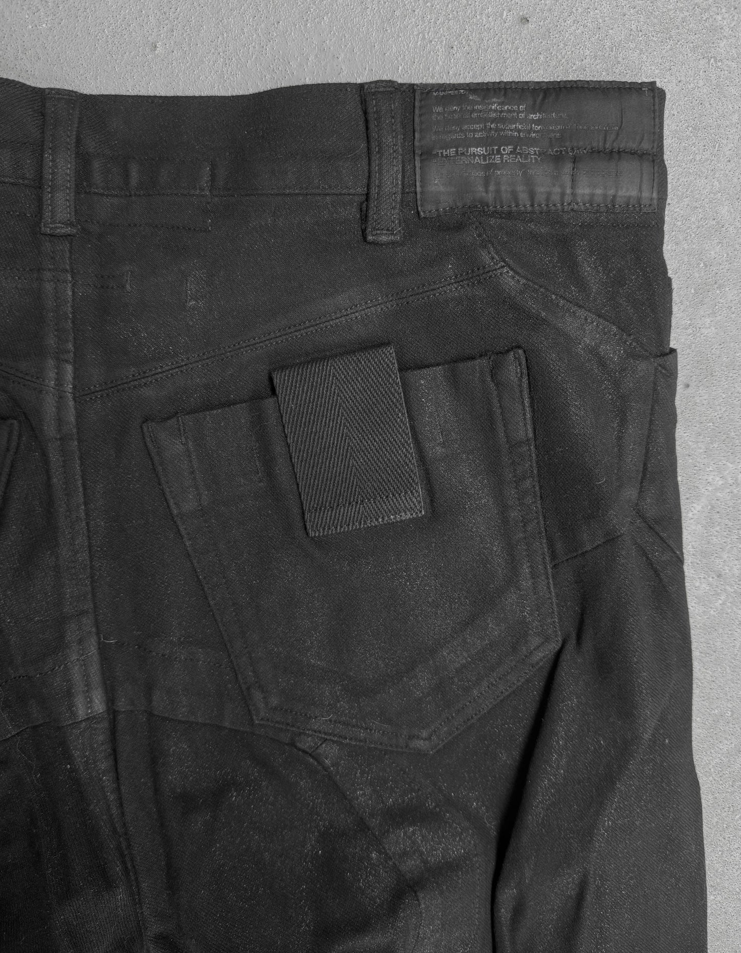 Julius_7 SS15 "prism;" Geometric Drop-crotch Wax Coated Knit Denim