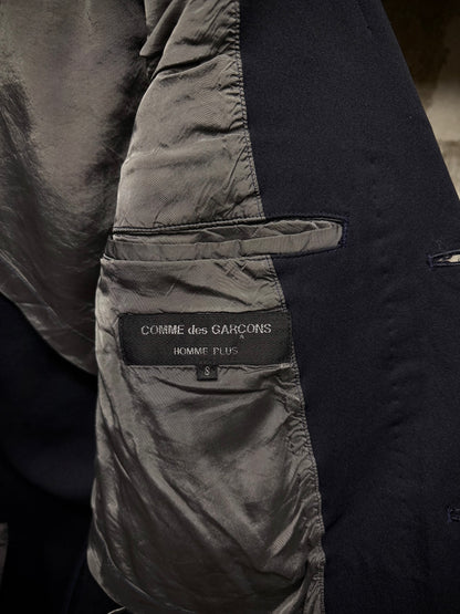 COMME des GARÇONS HOMME PLUS AW13 Dark Navy Hem Strap Poly Long Blazer detail | DRIEW GARMENTS