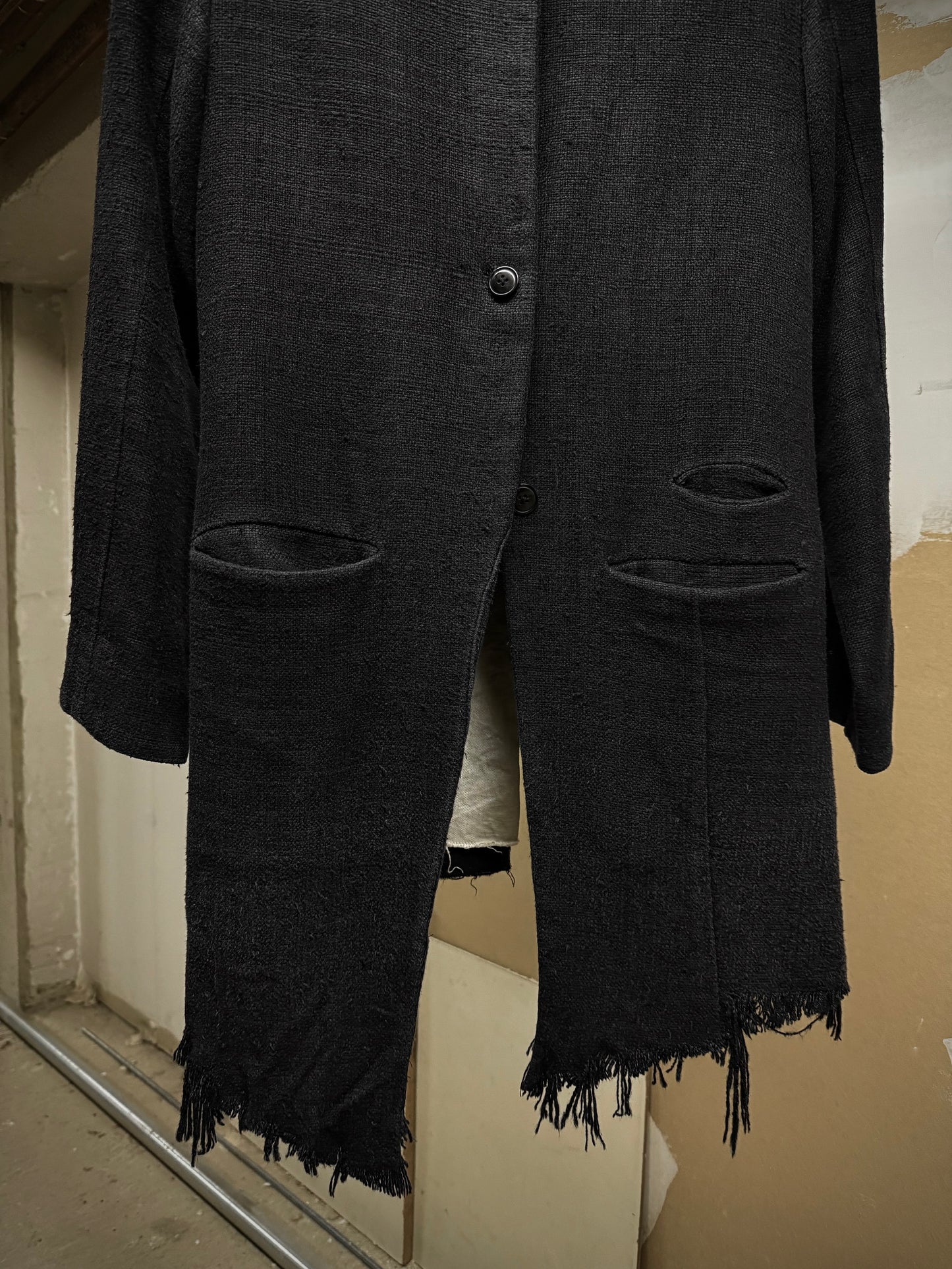 Aleksandr Manamïs Charcoal Grey Raw Silk Frayed Hem Coat detail | DRIEW GARMENTS