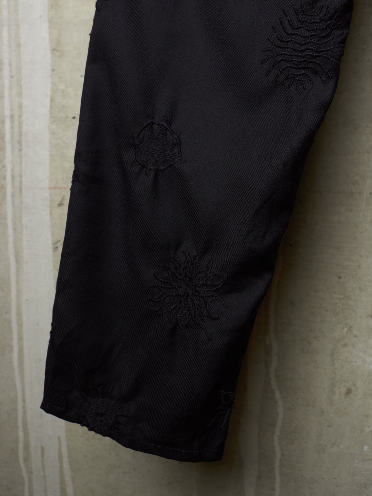 BLACK COMME des GARÇONS SS24 Black Sun Embroidered Wool Pants