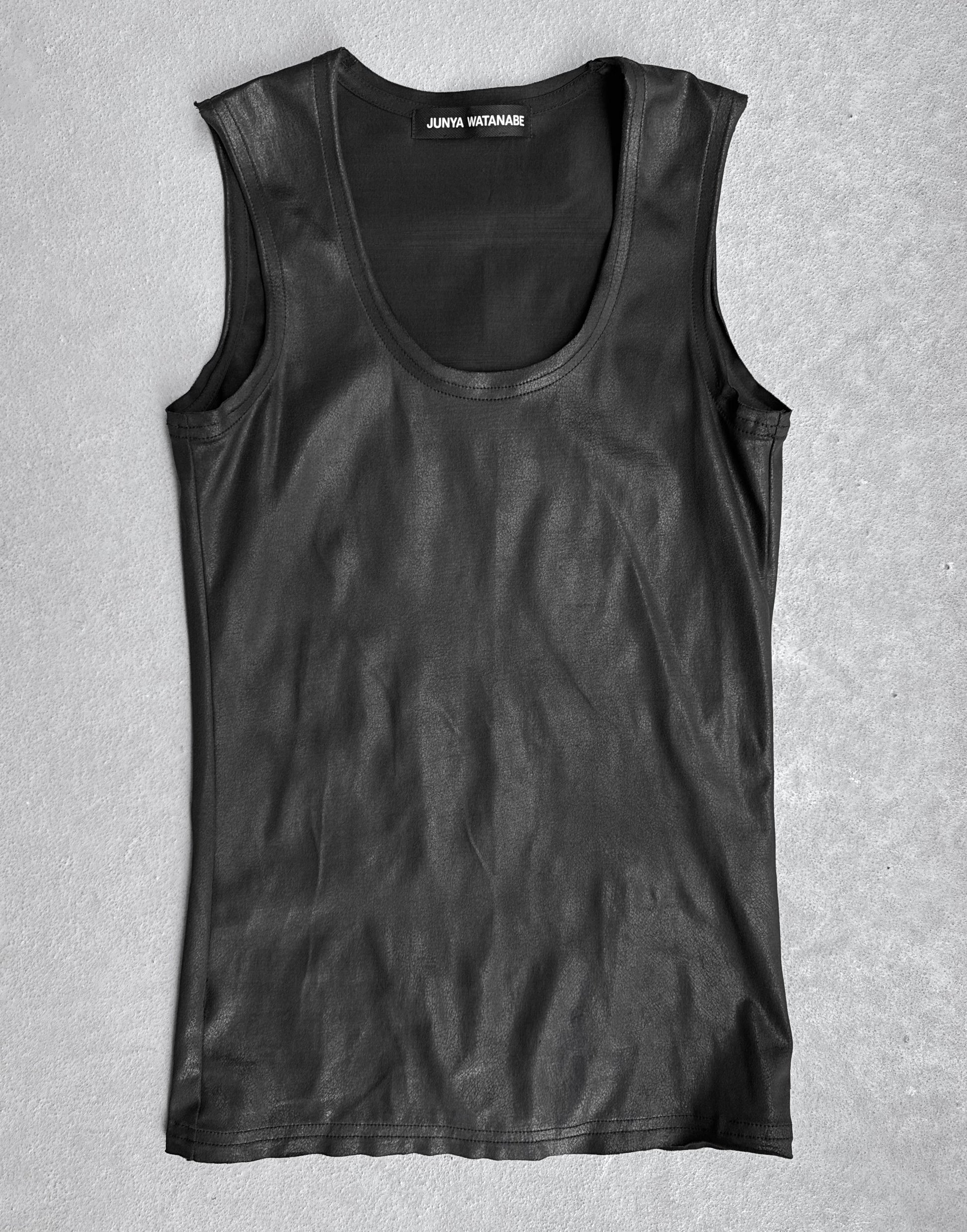 A Junya Watanabe SS23 Waxed Scoop-neck Tank Top in black, sleeveless with a slim fit, is shown laid flat on a light gray surface. Label inside the collar; flawless condition and available in size S.