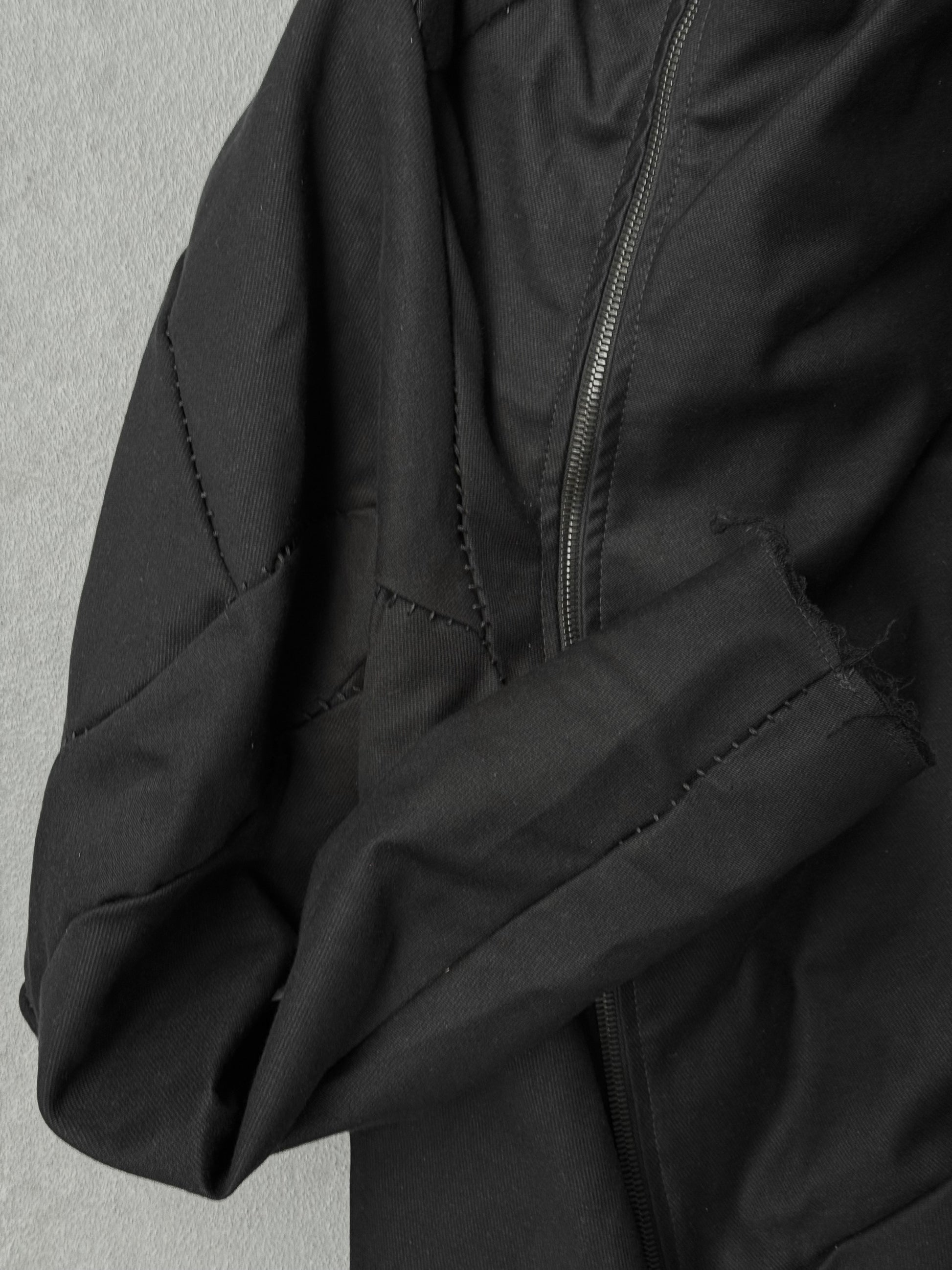 LEON EMANUEL BLANCK Distortion Curved Overlock Wool Lined Hooded Coat detail | DRIEW GARMENTS