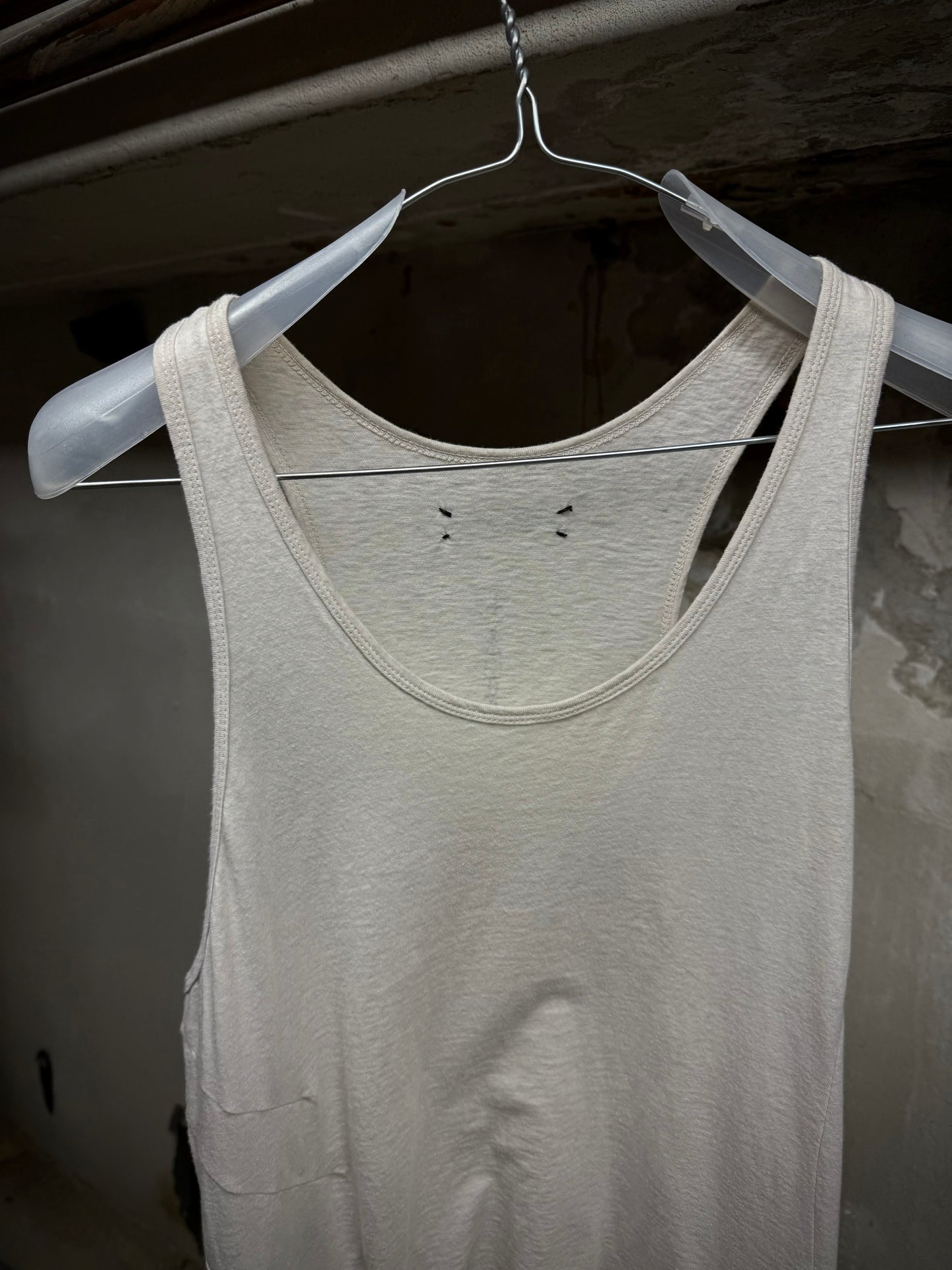 IfSixWasNine 'No. BONE-2/TK/M' Asymmetrical Raw Hem Cut Tank Top detail | DRIEW GARMENTS