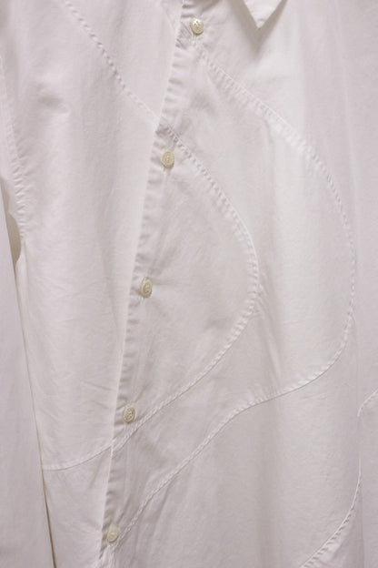 Close-up of a white shirt with button details