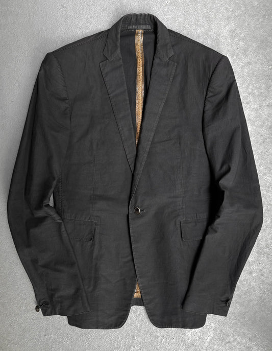 Black jacket on a textured gray background