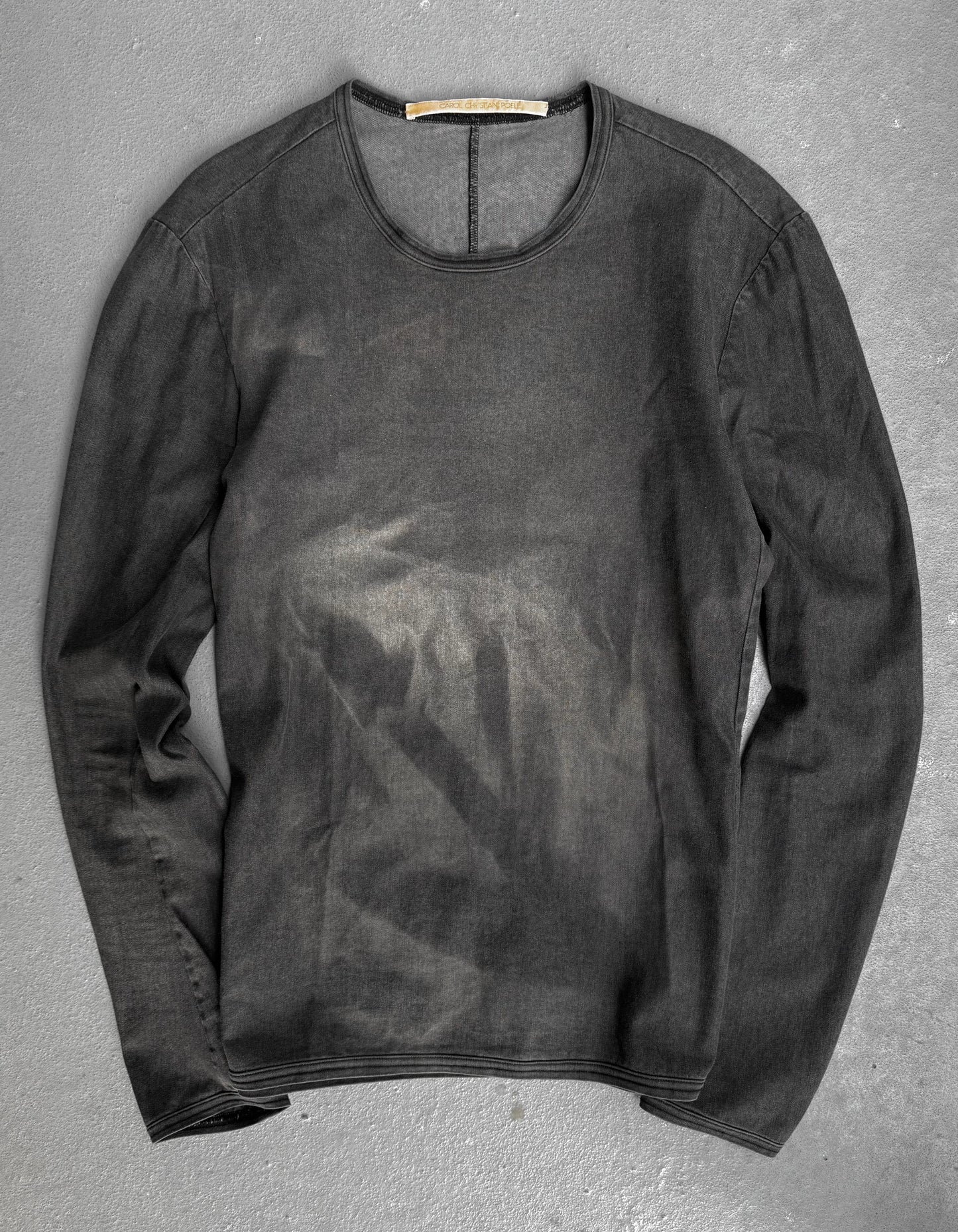 Dark gray long-sleeve shirt on a gray background