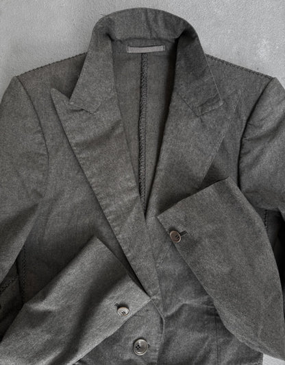 Gray coat with buttons on a gray background