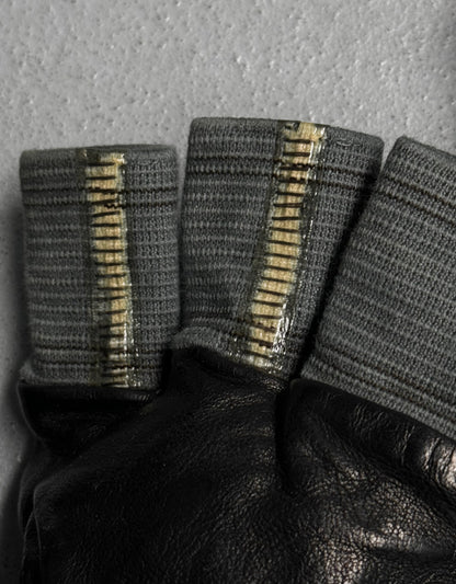 Close-up of textured gray socks with a pattern on a gray background