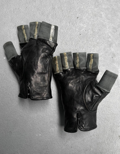 Pair of black leather gloves with gray accents on a gray background