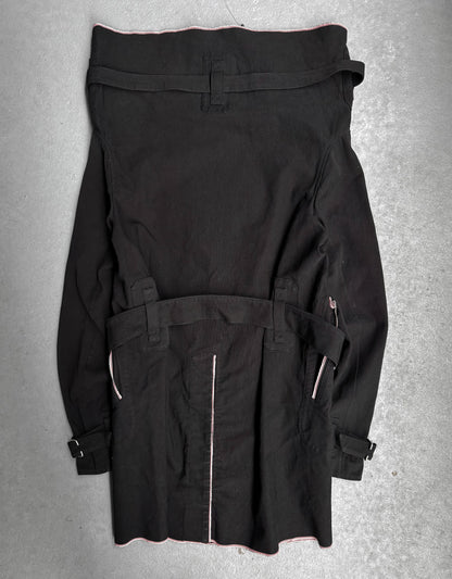 Black jacket with zippers on a gray background