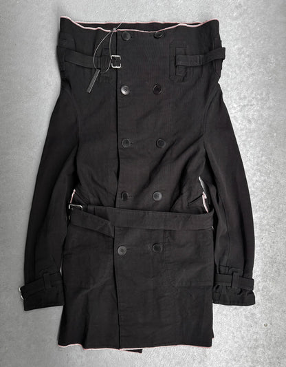 Black trench coat with belt on a gray background