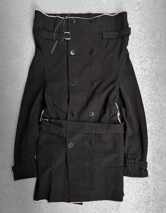 Black trench coat with belt on a gray background