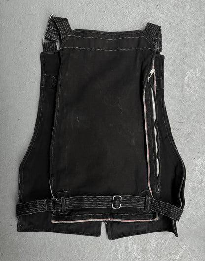 Black leather apron on a gray surface