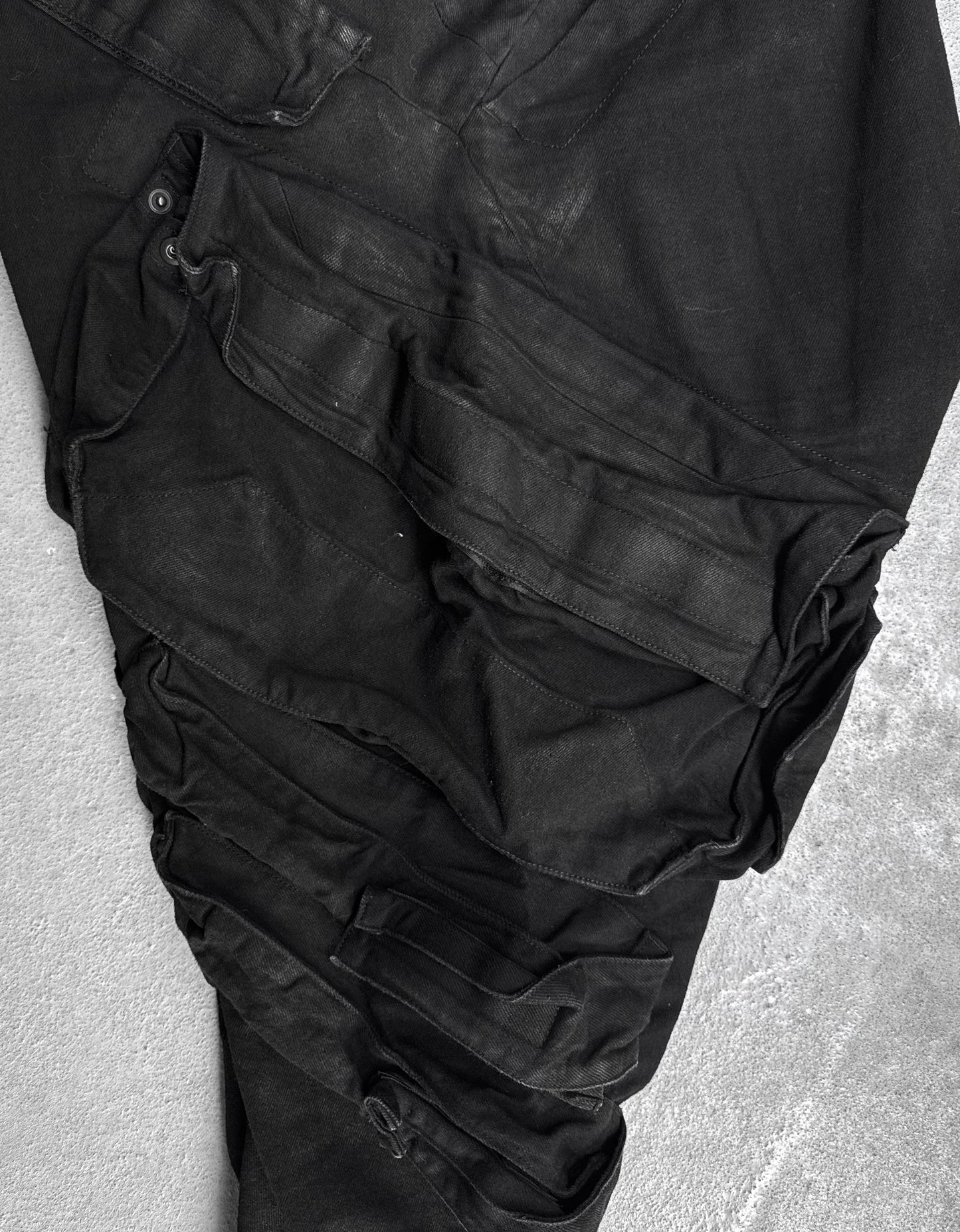 Julius_7 SS15 “prism;” Waxed Jumbo Velcro Gas-Mask Cargos Denim