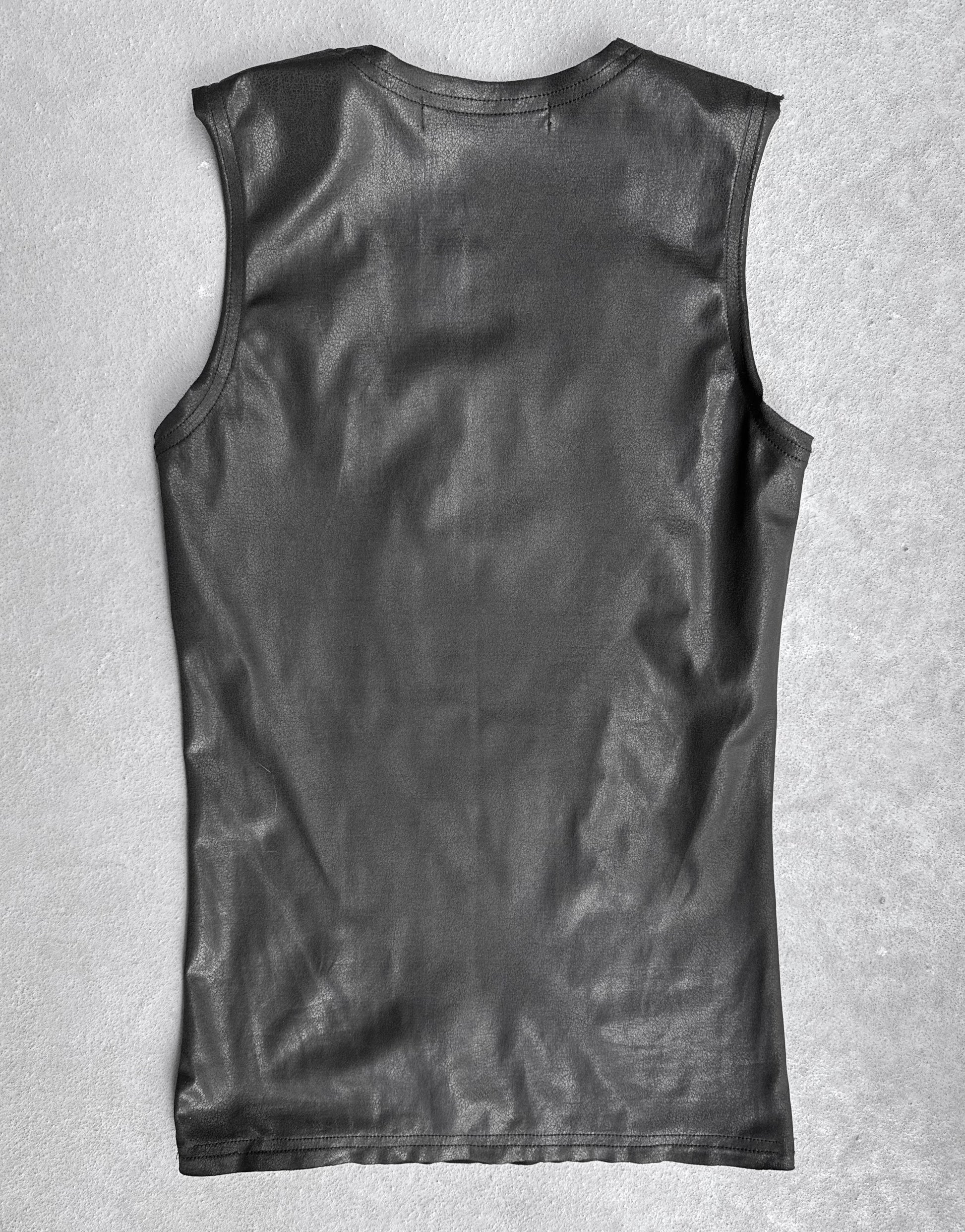 A Junya Watanabe SS23 waxed scoop-neck tank top in black, size S and slim fit, is displayed in flawless condition laid flat on a light gray textured surface, showing the back.