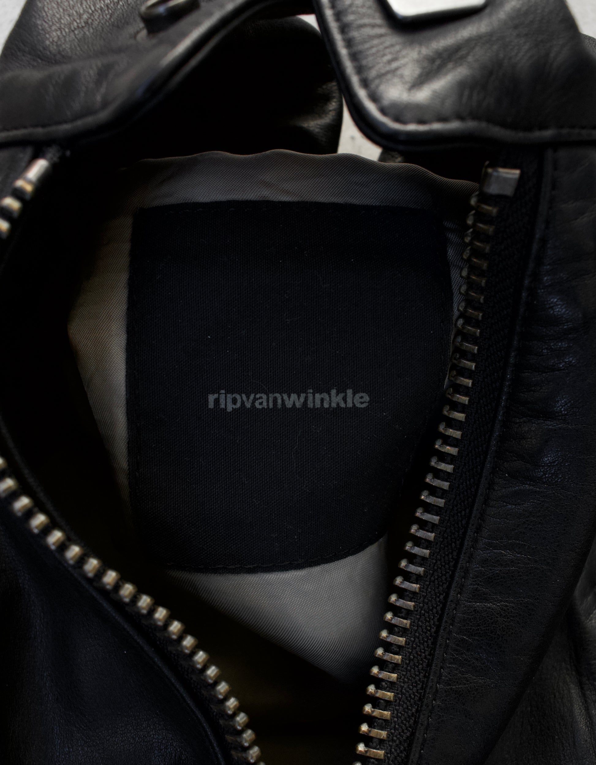 brand tag detail shot RipVanWinkle AW06 Multi-zip Steerhide Moto Cow Leather Jacketv