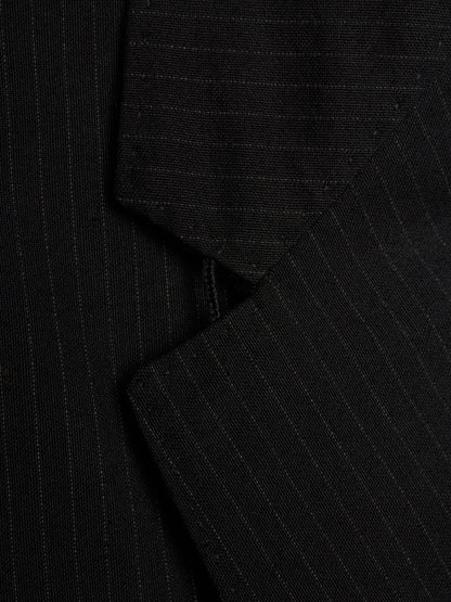 Close-up of a black pinstriped fabric, showing the fine vertical stripe pattern and texture.