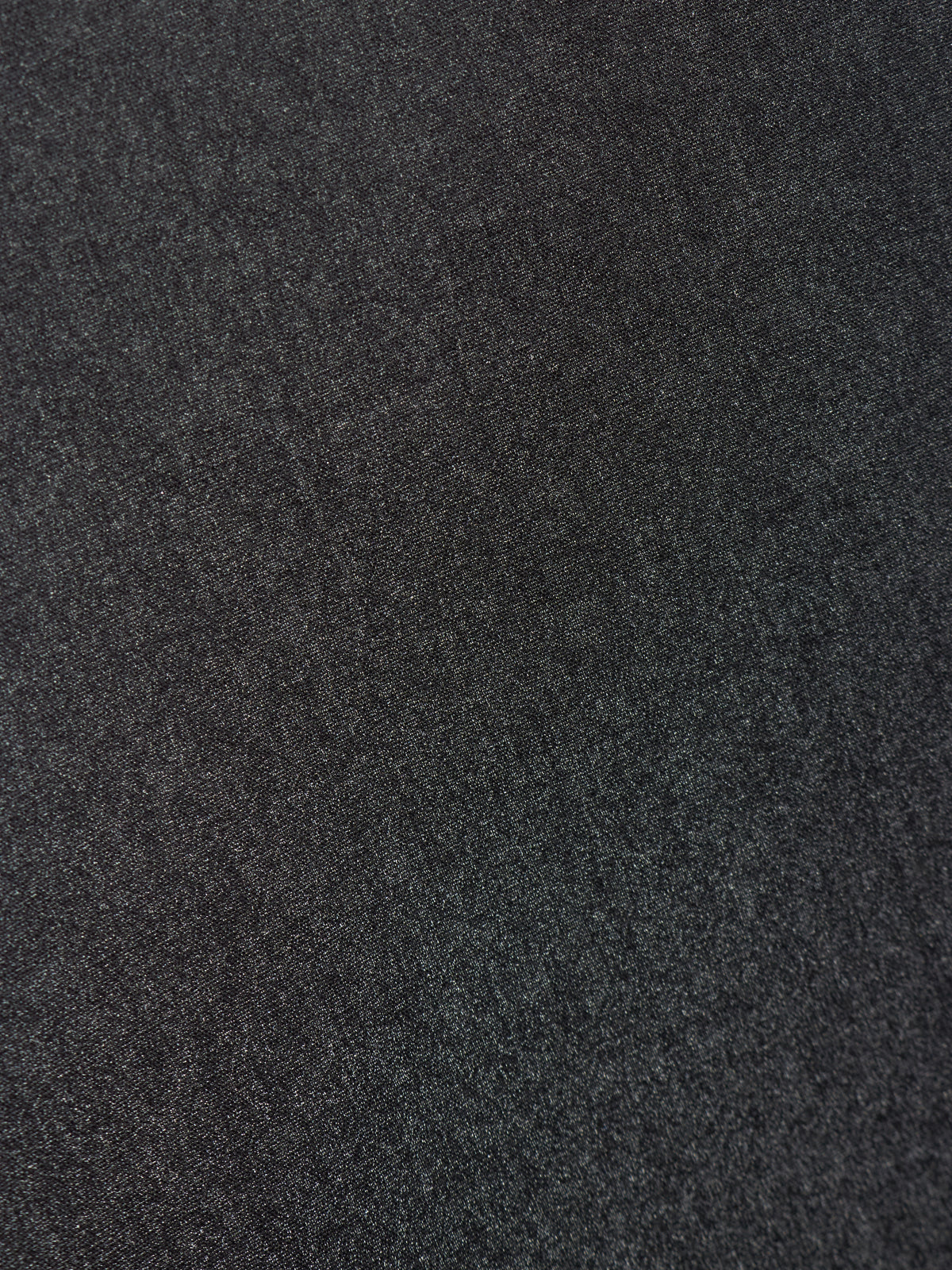 A close-up texture shot of a dark charcoal gray felt or wool fabric.