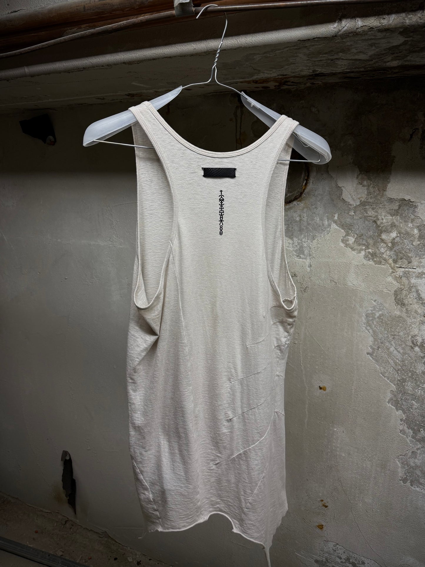 IfSixWasNine 'No. BONE-2/TK/M' Asymmetrical Raw Hem Cut Tank Top detail | DRIEW GARMENTS