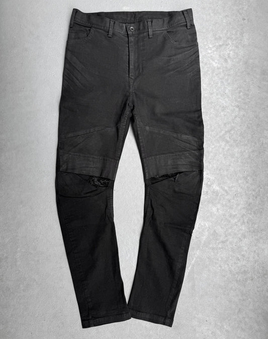 Julius_7 SS17 “Knives;” Distressed Wax Knee-Panel Skinny Denim