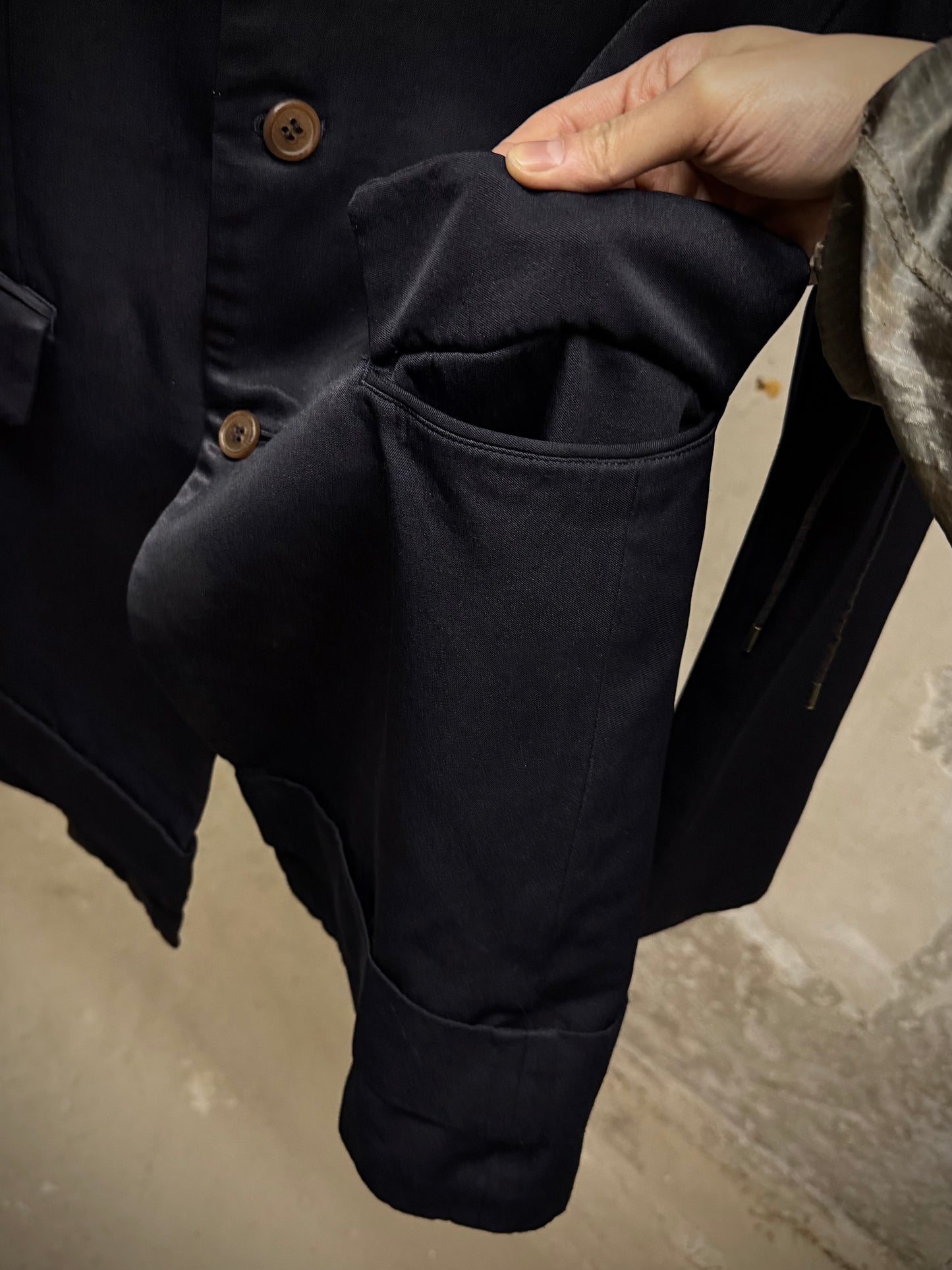 COMME des GARÇONS HOMME PLUS AW13 Dark Navy Hem Strap Poly Long Blazer detail | DRIEW GARMENTS