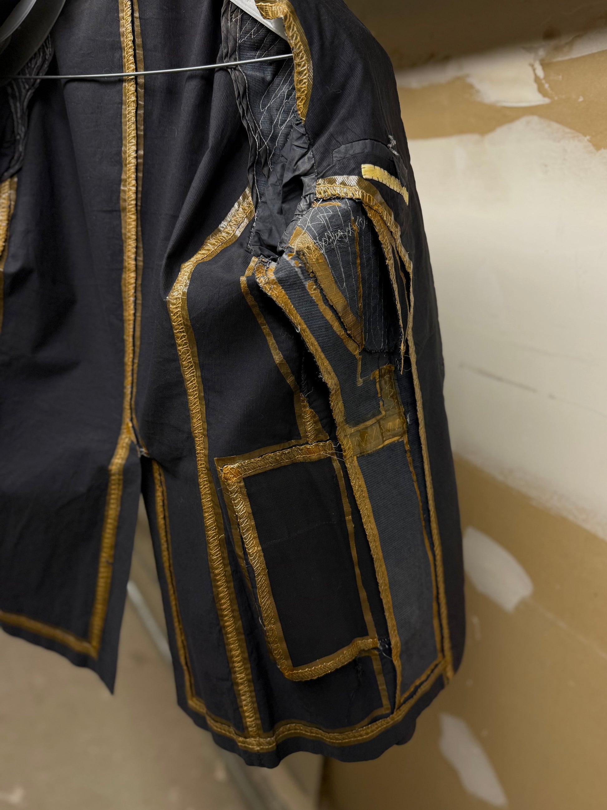 Carol Christian Poell 2010 'GM/2618OOD CORD-PTC/10' Taped Seam Titanium Prosthetic Elbow Overlock Bla detail | DRIEW GARMENTS