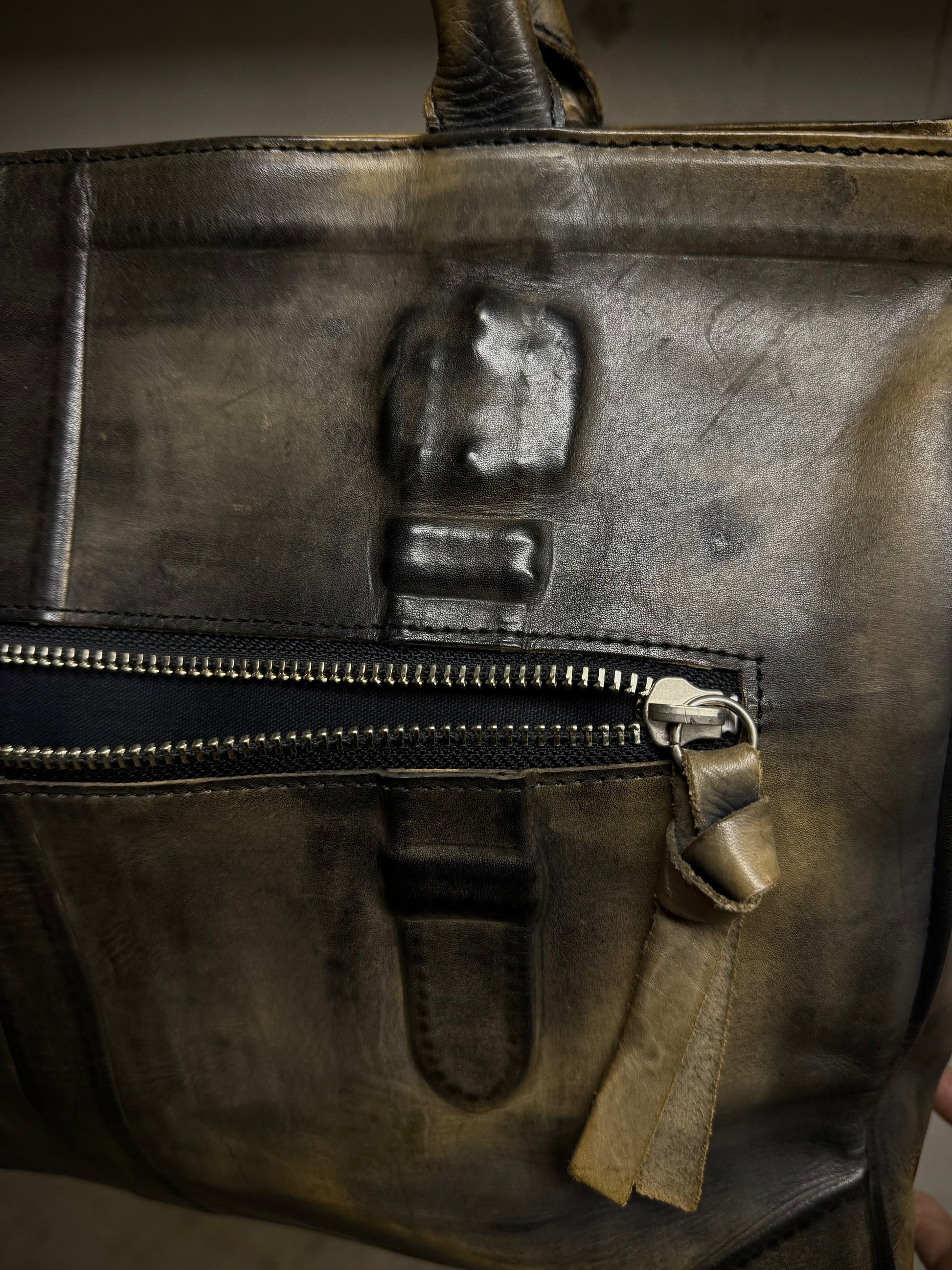 Mihara Yasuhiro AW11 'Aburidashi' Embossed Patina Mustard Kip Leather Briefcase detail | DRIEW GARMENTS