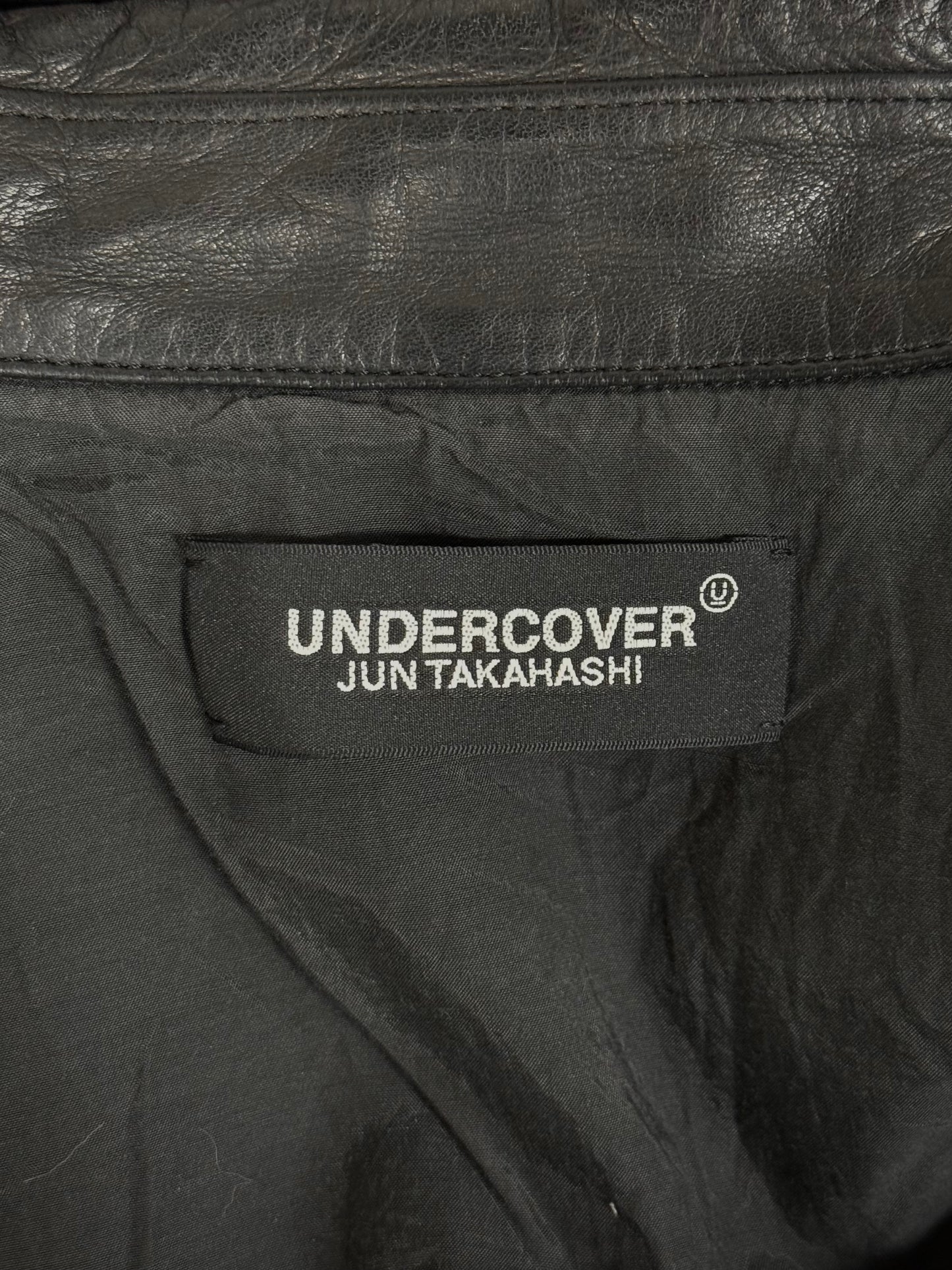 UNDERCOVER SS22 “Once in a Lifetime” Graphic Printed Hybrid Jersey Leather Perfecto Jacket