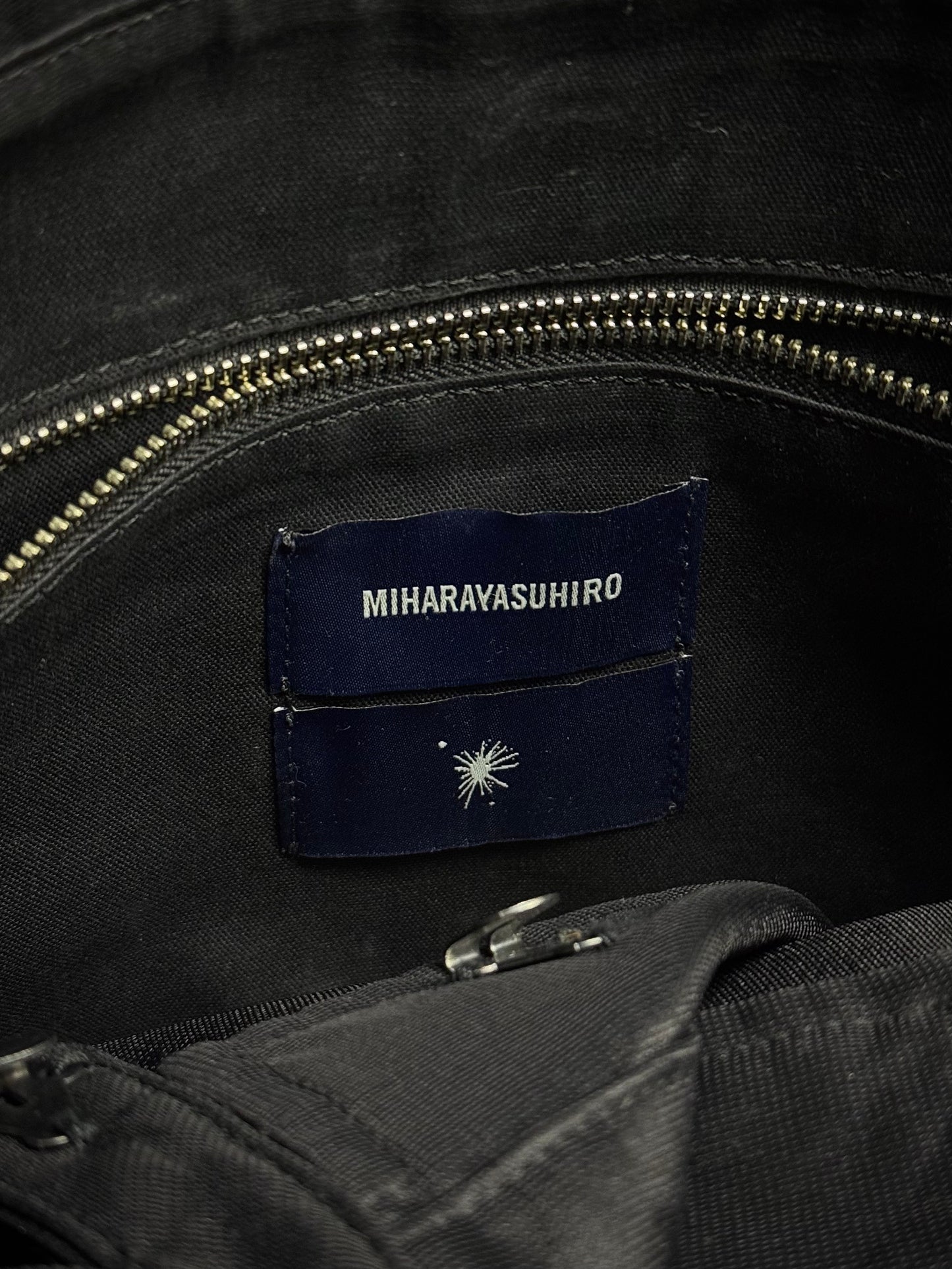 Mihara Yasuhiro AW11 'Aburidashi' Embossed Patina Mustard Kip Leather Briefcase detail | DRIEW GARMENTS