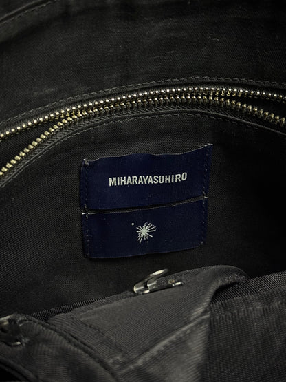 Mihara Yasuhiro AW11 'Aburidashi' Embossed Patina Mustard Kip Leather Briefcase detail | DRIEW GARMENTS